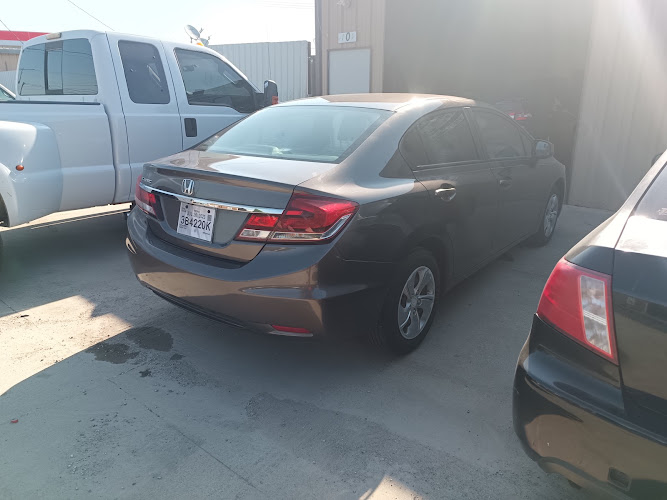 J QUE CARS AND TRUCKS LLC