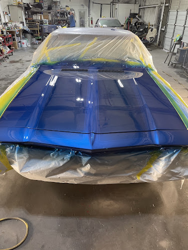 Slick 'Em Paint & Body